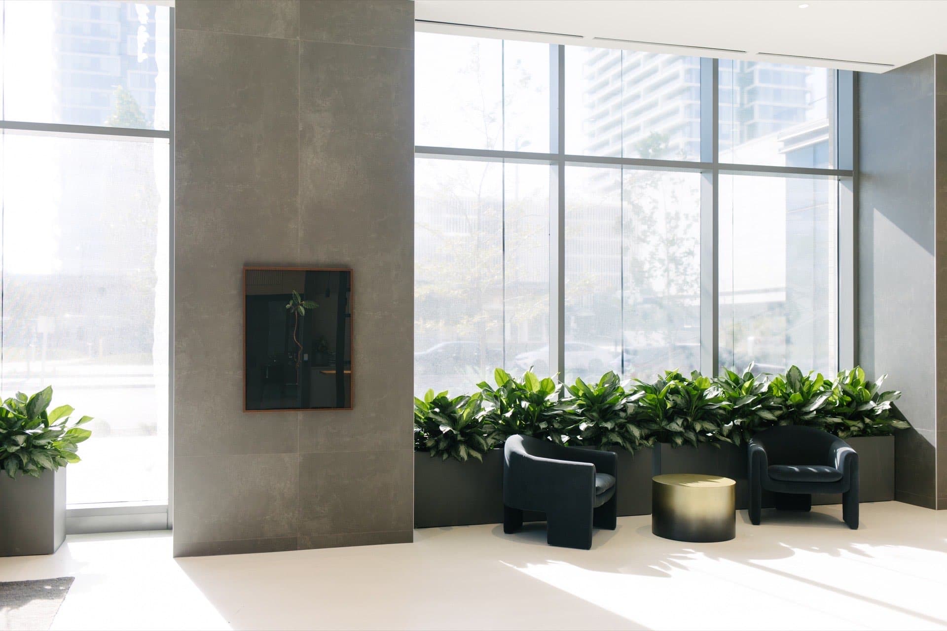 Corporate plant rental by Benji's — healthy plants in a Vancouver office lobby